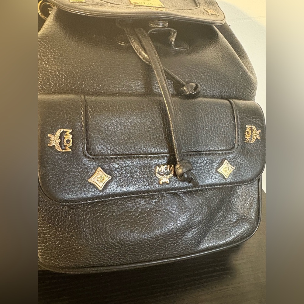 MCM Black Leather Backpack with Gold Accents and draw strings 12"x11" - Picture 10 of 16